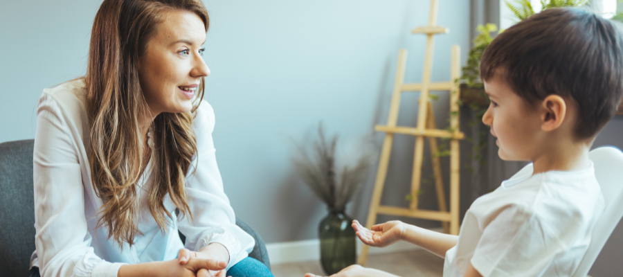 Autism Tests and Screeners: Understanding the Most Common Autism Testing Tools 3 doctor using a questionnaire for autism testing